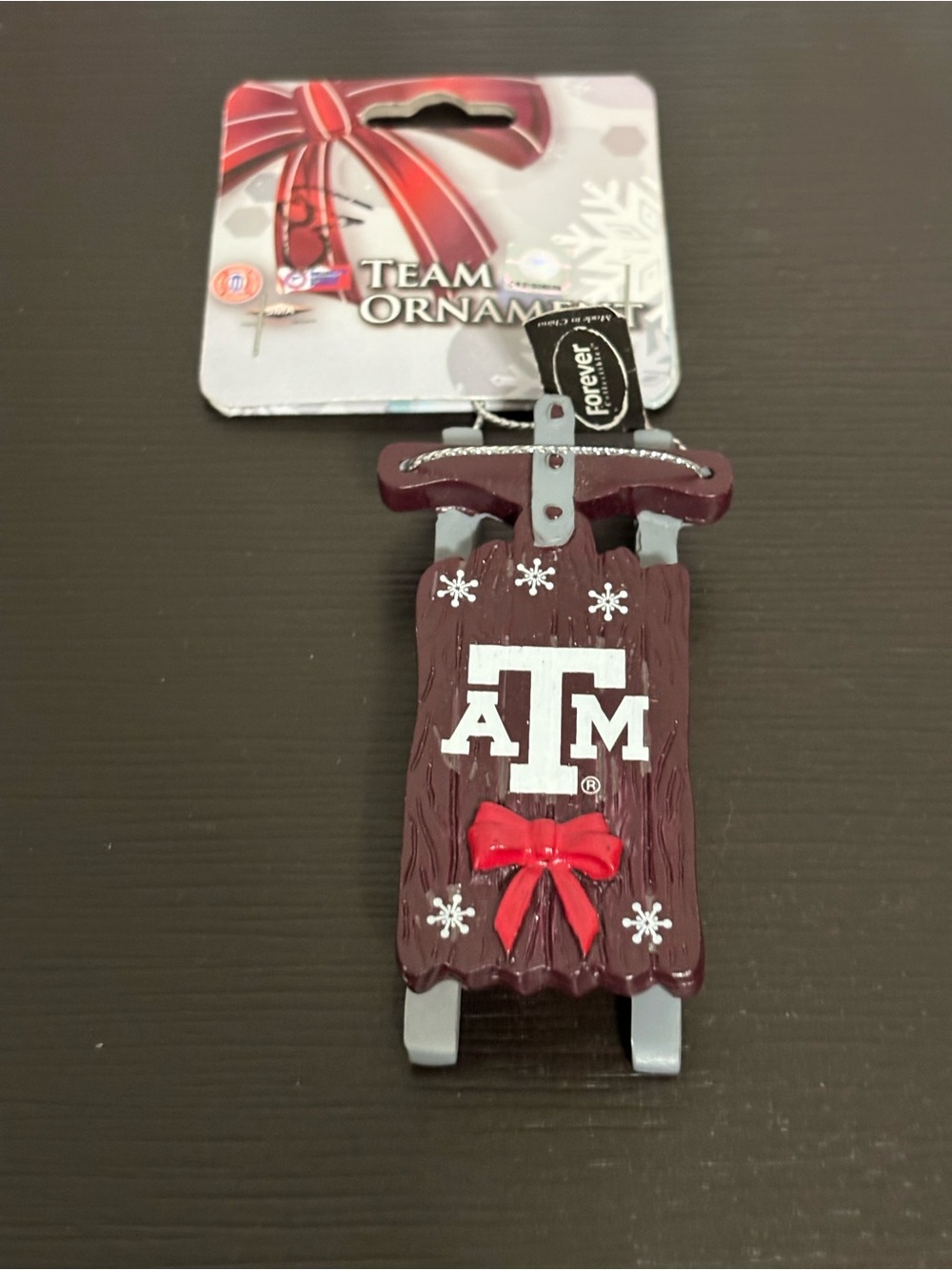 Forever Collectibles Ornament dog sled Texas A & M Christmas ornament. NWT